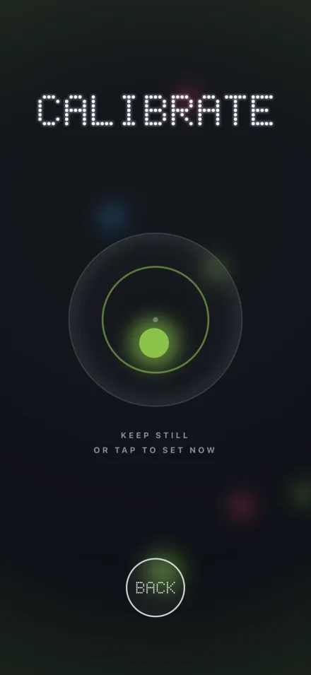 The calibrate screen: a green Tiltling settling in a ring, with the words keep still or tap to set now.