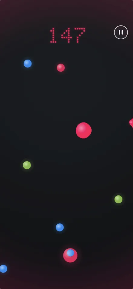 A round in progress: a pink Tiltling among small pink, blue and green dots, with the score 147 in pink dots.